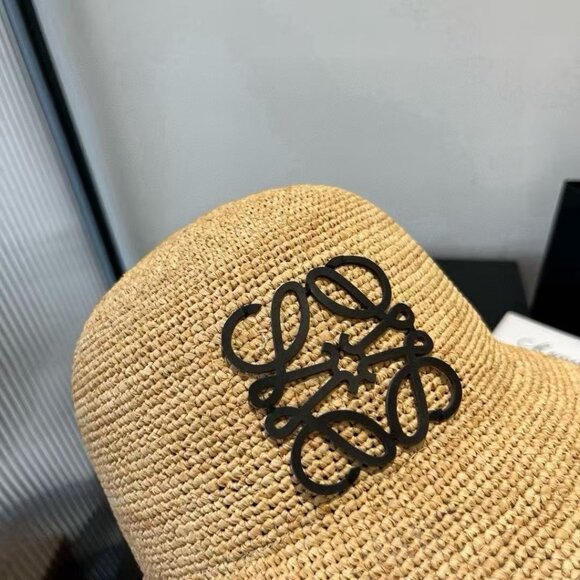 Loewe Tan Straw Hat featuring a black logo